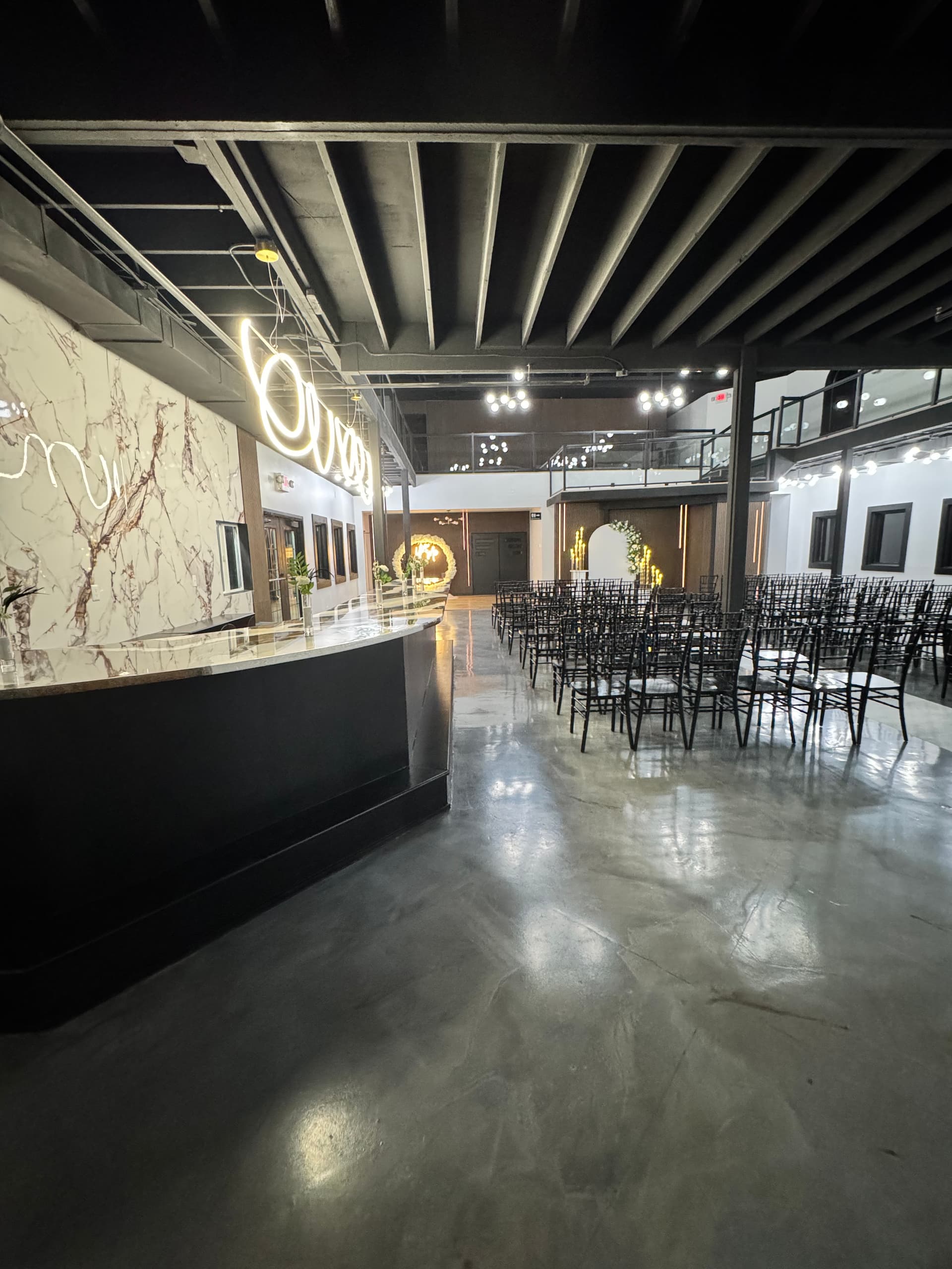 Wide angle ceremony and bar perspective at Altar'd Event Venue